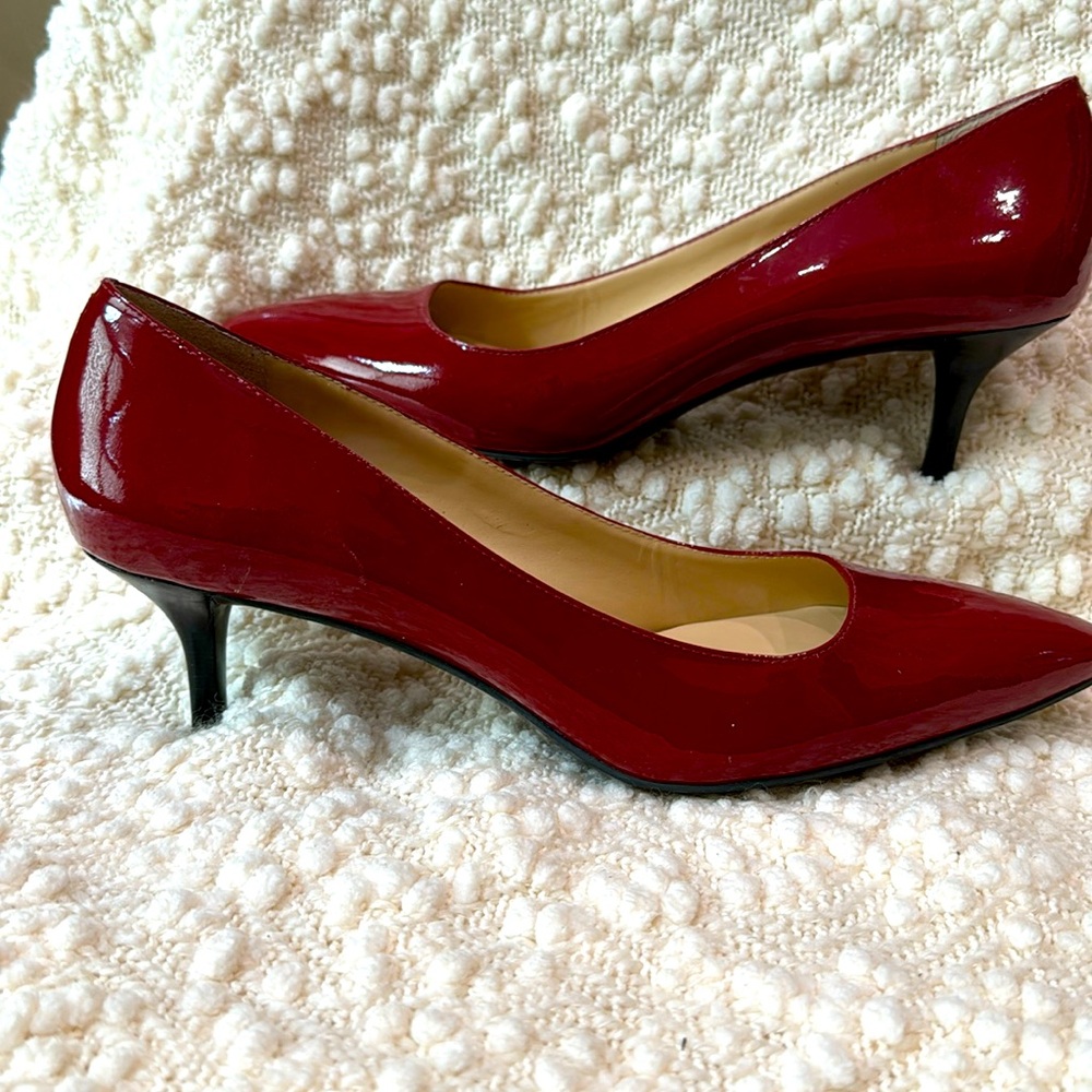 Size 11B Cole Haan pump in red patent.